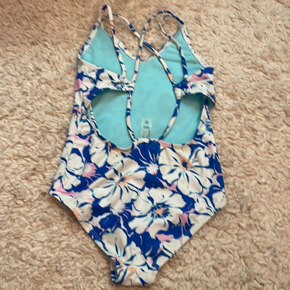 Girls swimsuit. In good condition. Has a yellow stain as seen on last pic. - Picture 2 of 4